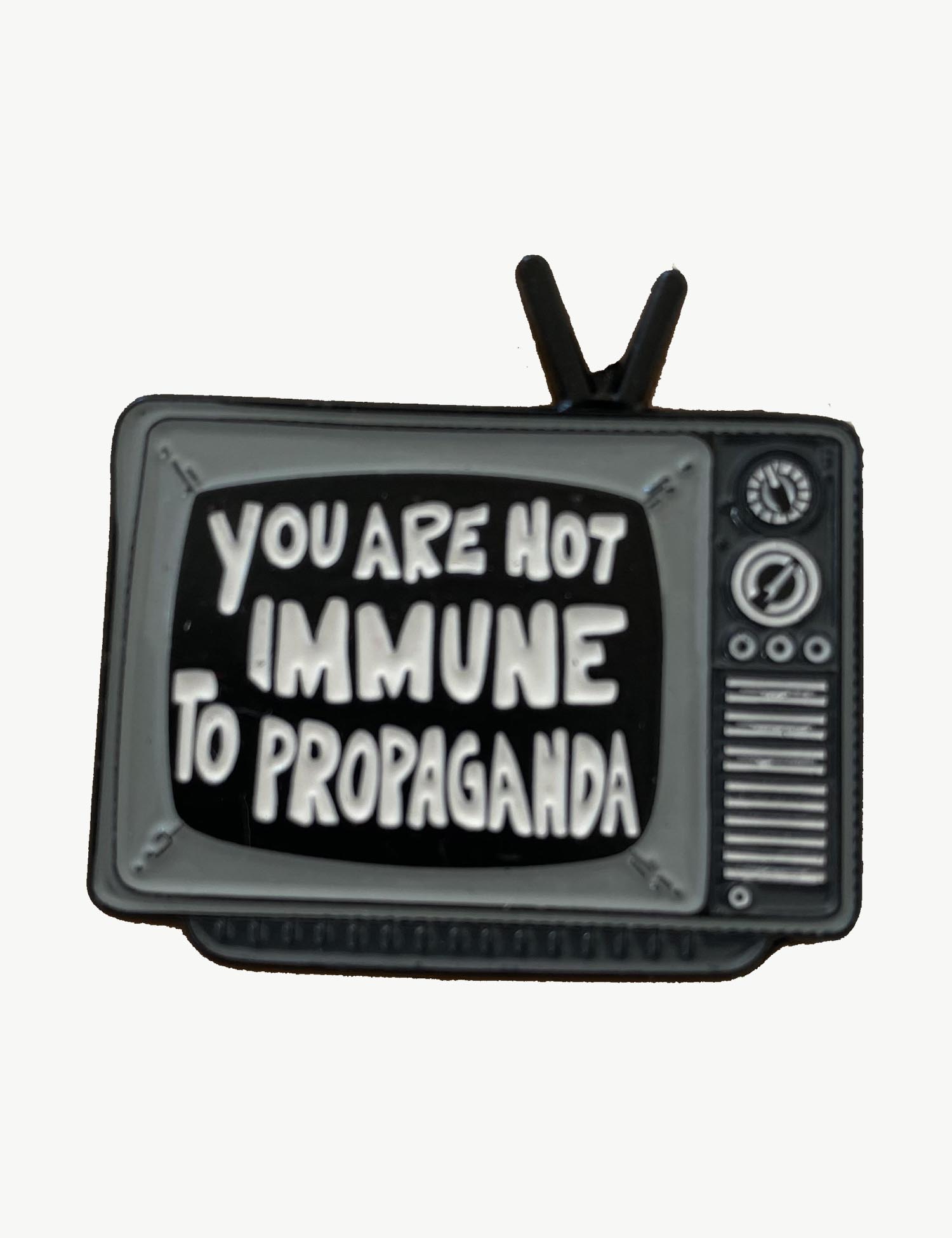 Pin's militant "You are not immune to propaganda"