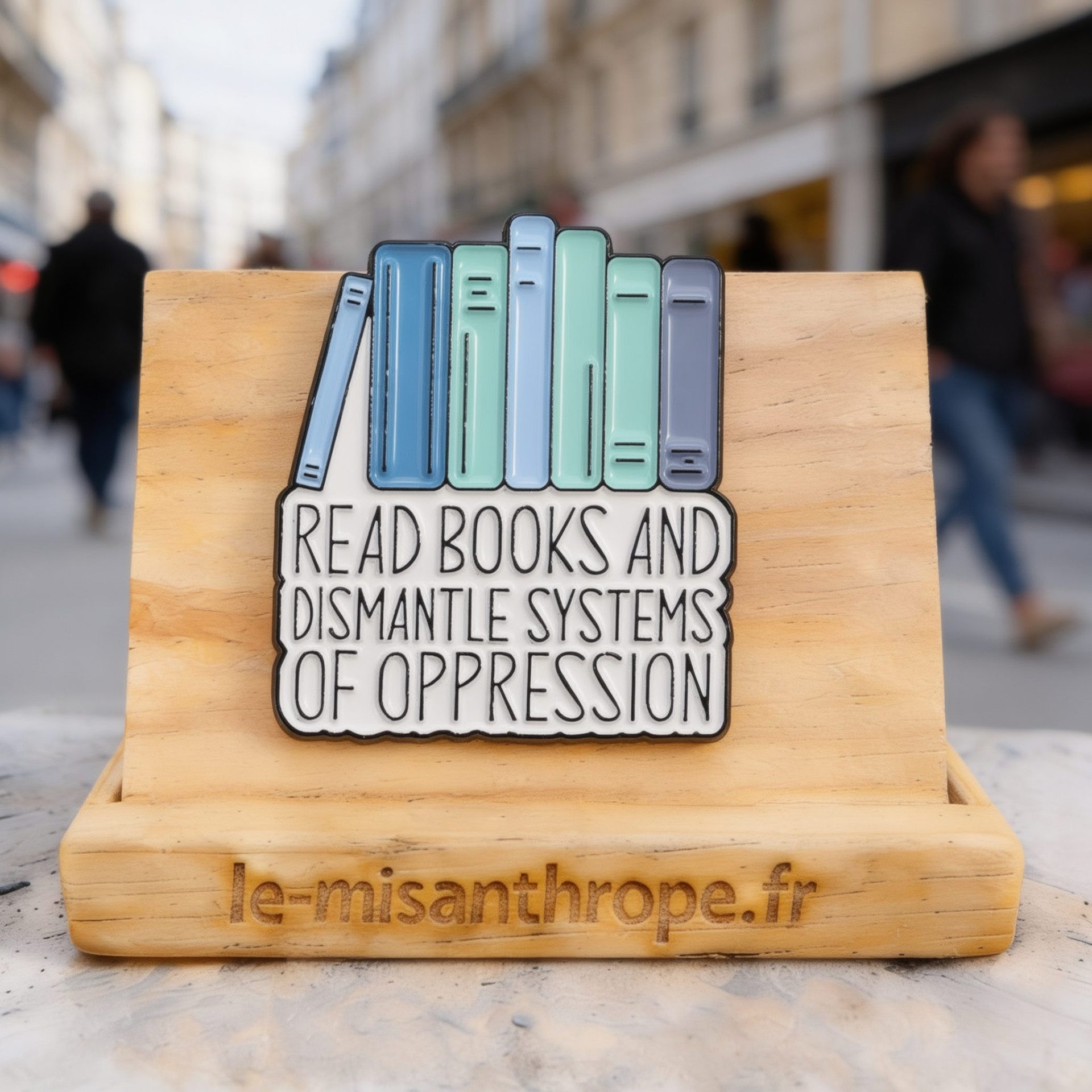 Pin’s militant Read books and dismantle systems of oppression