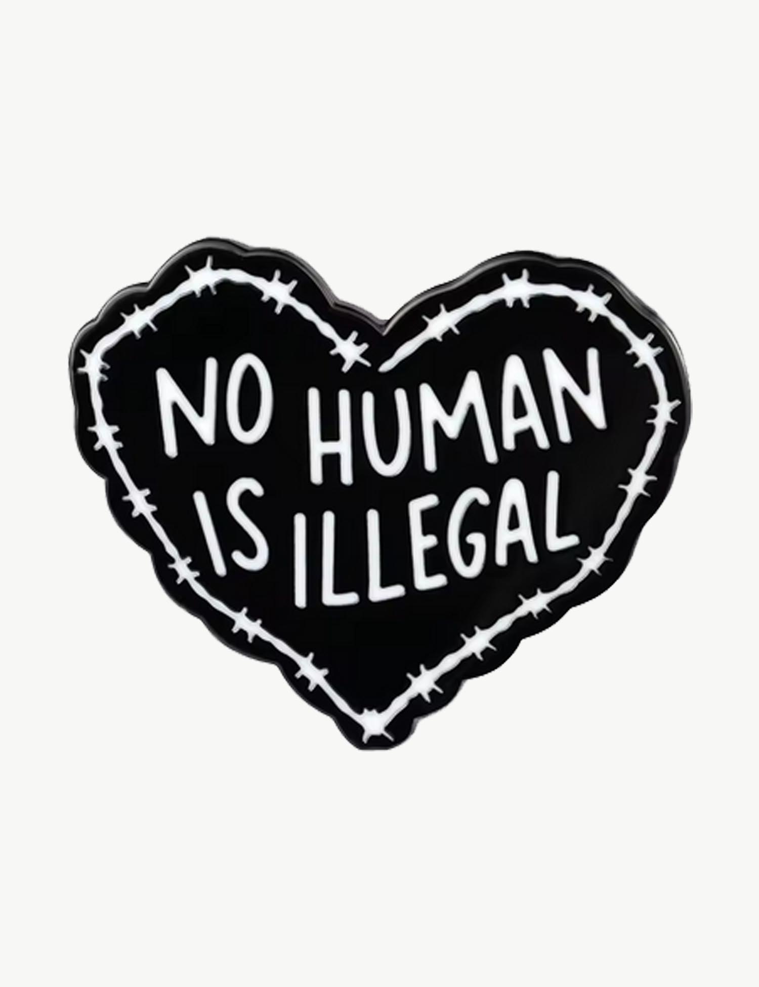 Pin's militant "No human is illegal"