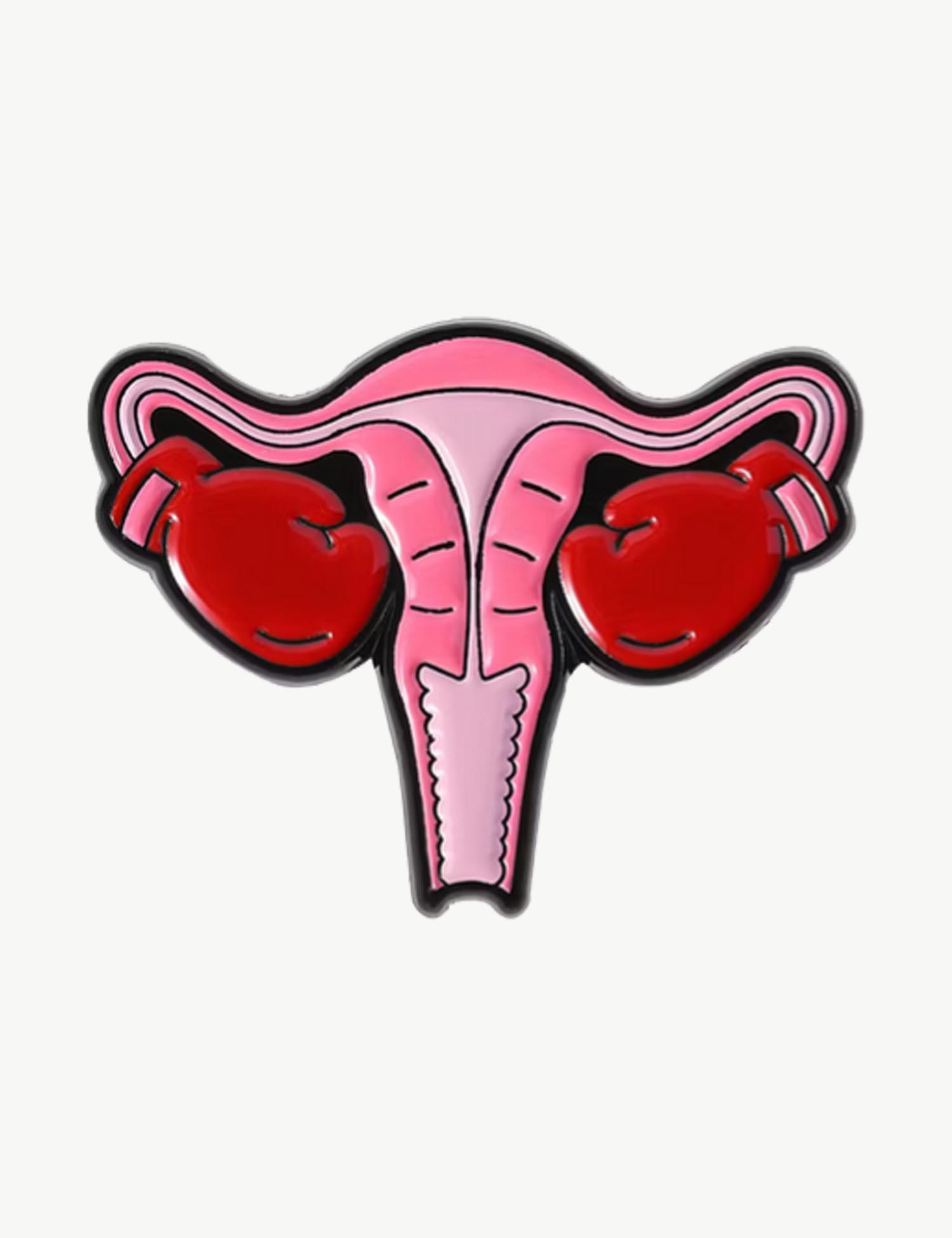 Pin's féministe "Ovaires boxe"